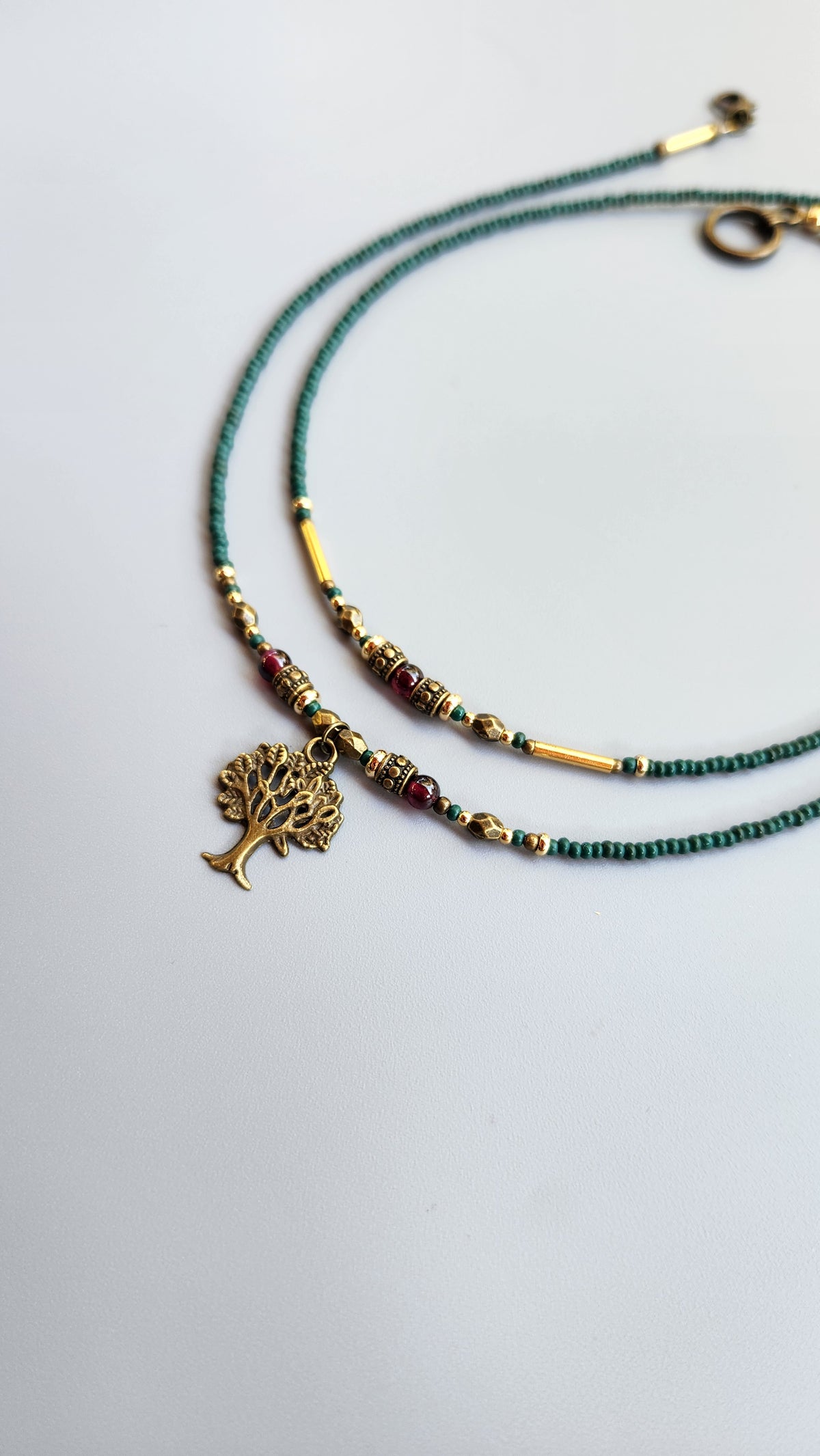 Vintage Bronze Necklace with Garnet, Turquoise Beads and Gold-Plated Spacers