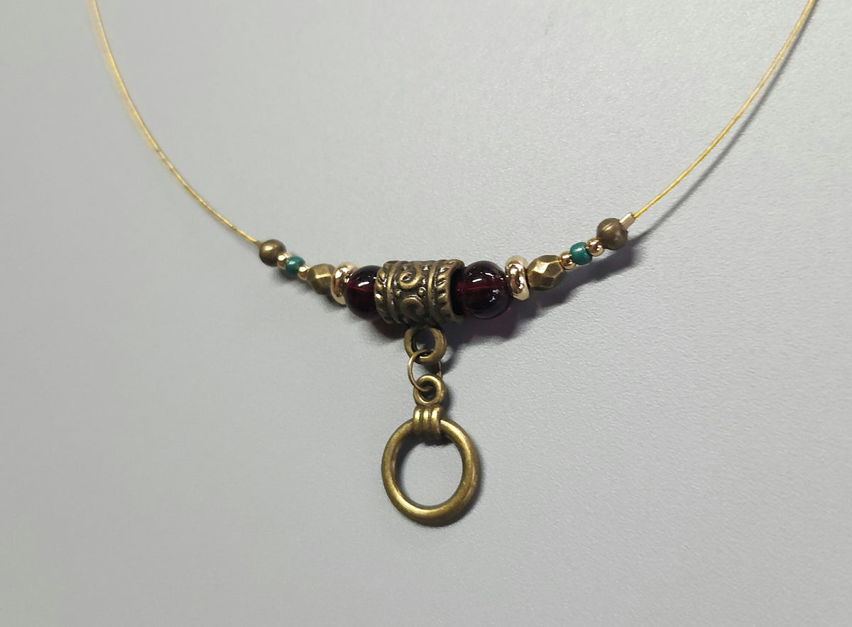 Bronze Necklace with Garnet Stones, Turquoise Beads and Gold-Plated Spacers