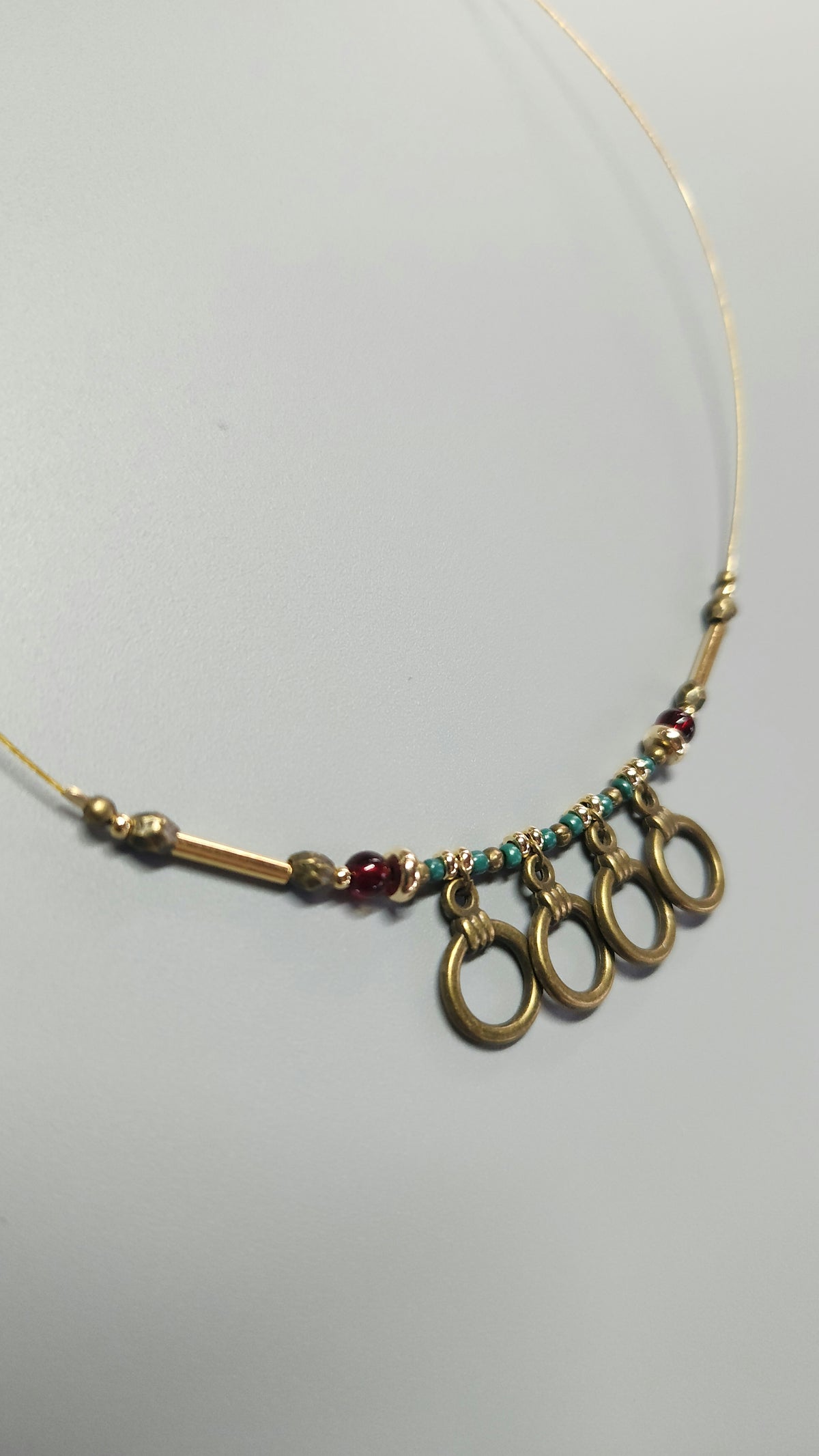 Bronze Necklace with Garnet Stones, Turquoise Beads and Gold-Plated Spacers