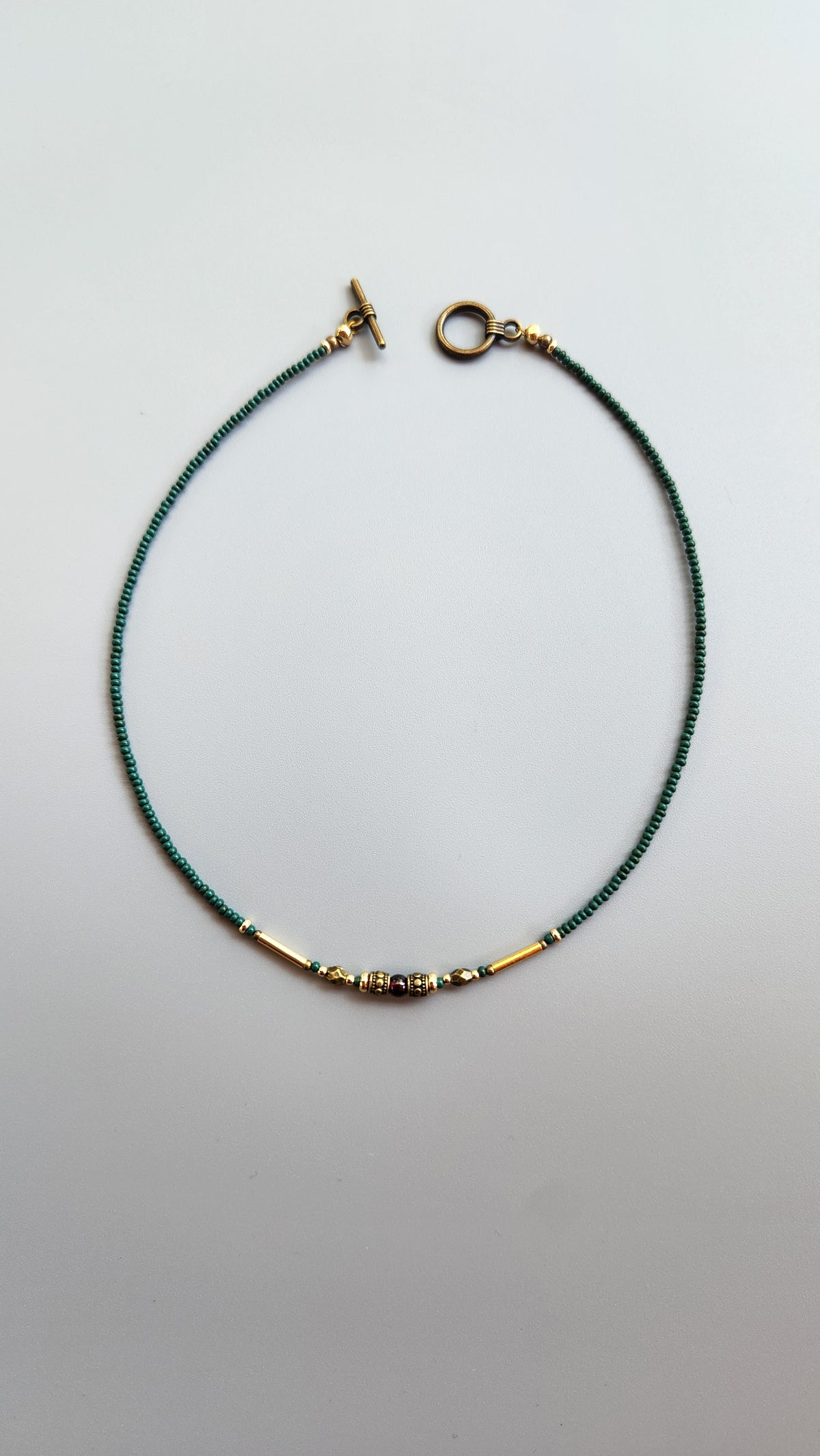 Vintage Bronze Necklace with Garnet, Turquoise Beads and Gold-Plated Spacers