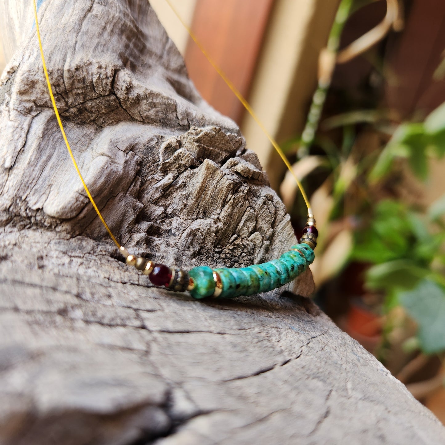 Vintage Bronze Necklace with African Turquoise, Garnet, and Gold-Plated Spacers