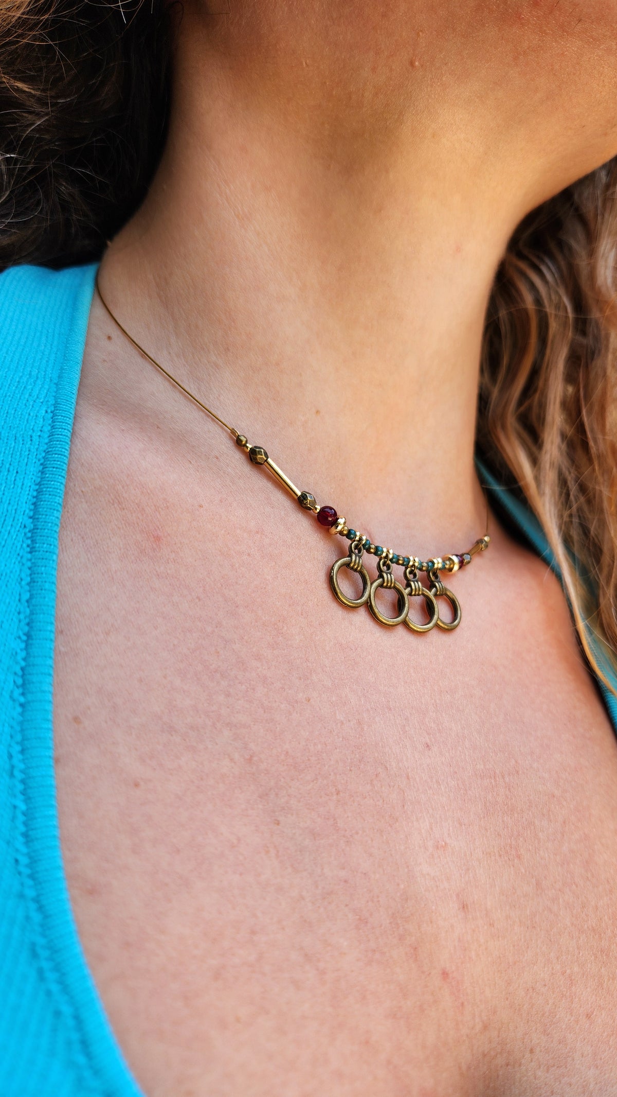 Bronze Necklace with Garnet Stones, Turquoise Beads and Gold-Plated Spacers