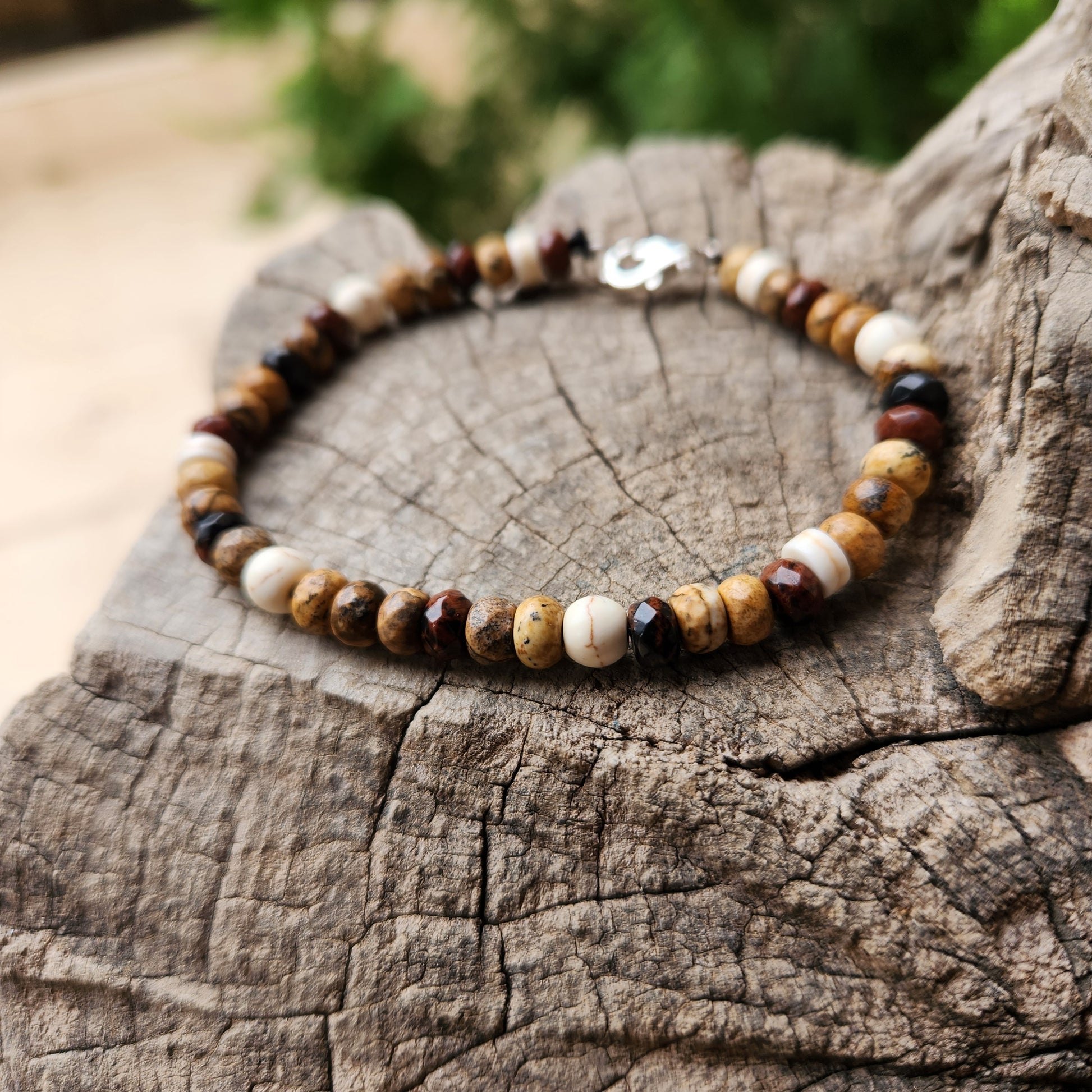 Beaded bracelet on a wooden surface with a natural background