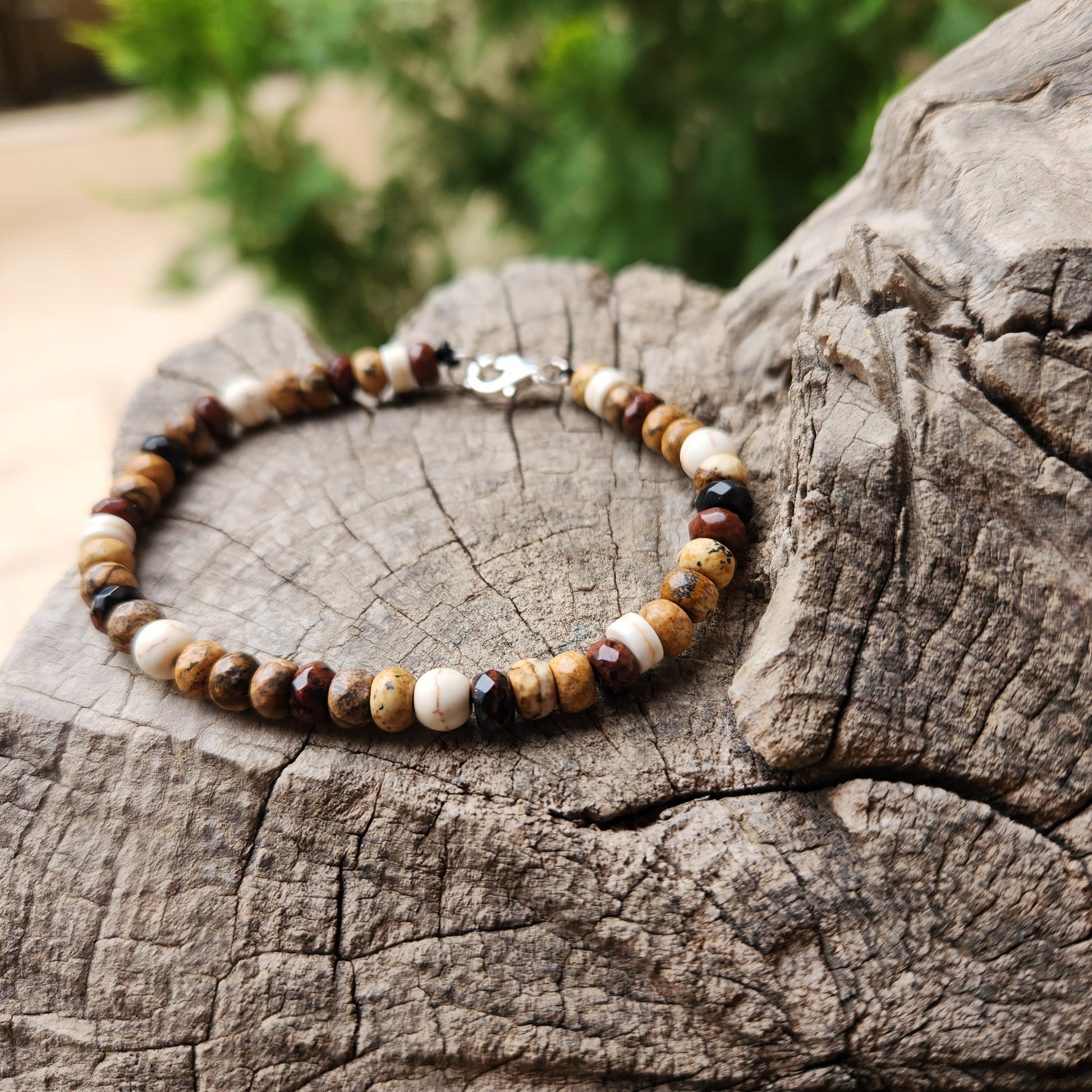 Beaded bracelet on a wooden surface with a natural background